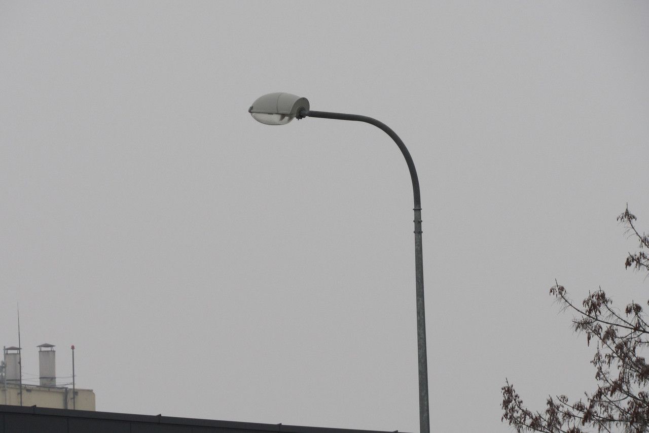 Double-arm bracket for lighting poles (designed for mounting two luminaires).
