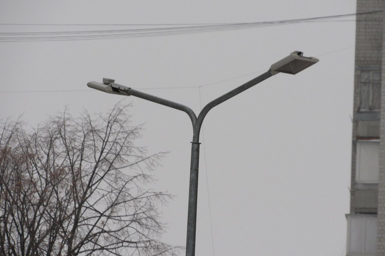 Double-arm bracket for lighting poles (designed for mounting two luminaires).