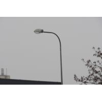 Single-arm bracket for mounting one luminaire on a lighting pole.