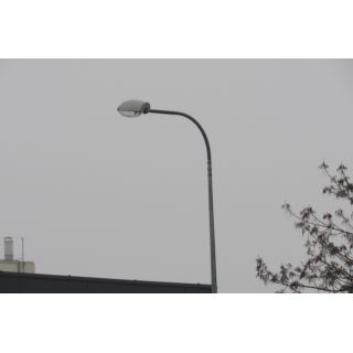 Single-arm bracket for mounting one luminaire on a lighting pole.