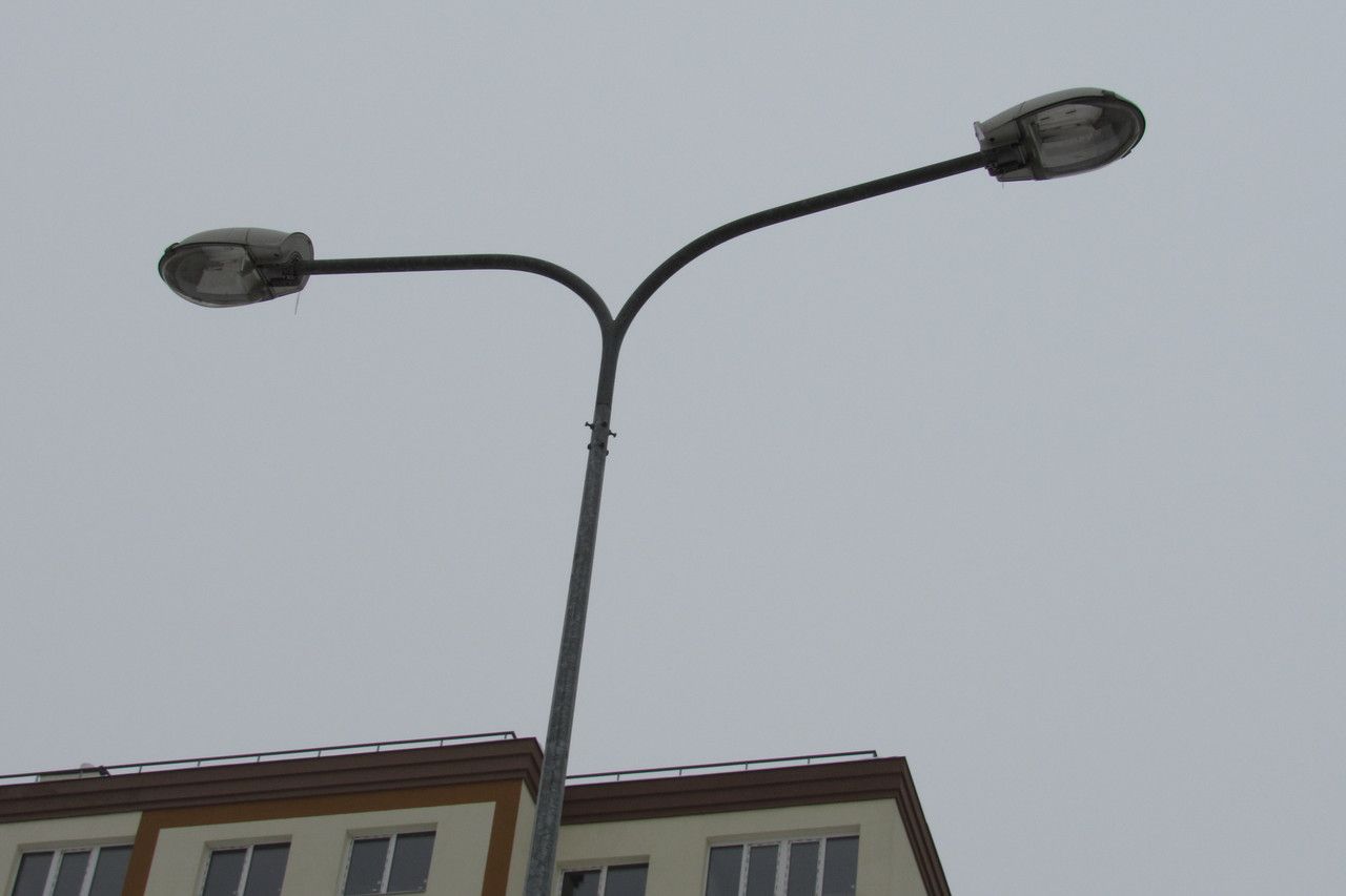 Double-arm bracket for lighting poles (designed for mounting two luminaires).