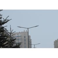 Double-arm bracket for lighting poles (designed for mounting two luminaires).