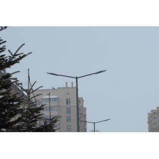 Double-arm bracket for lighting poles (designed for mounting two luminaires).